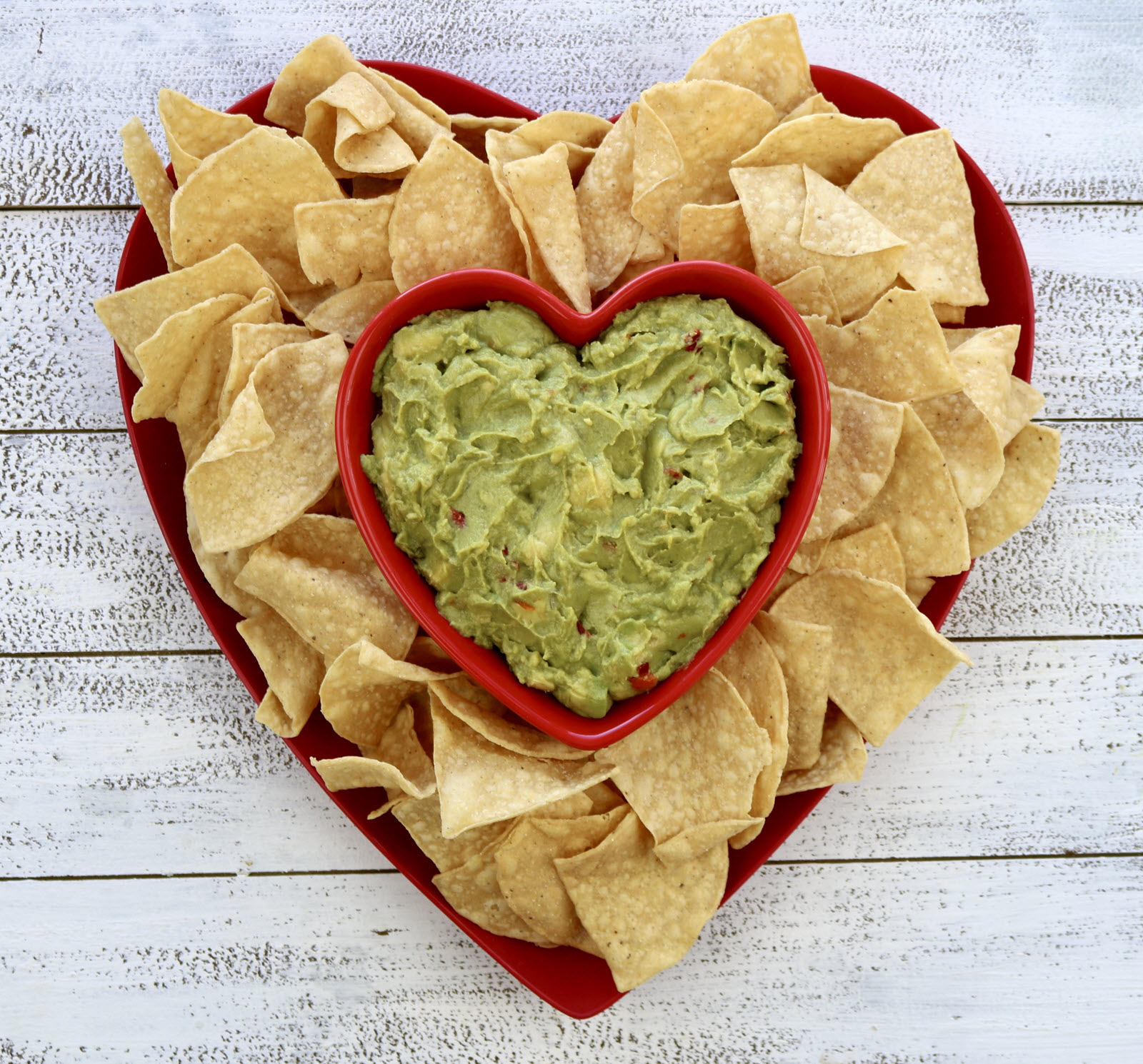Megamex foods valentines day chips with guacamole.