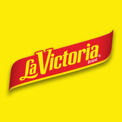 Megamex foods la victoria logo with yellow background.
